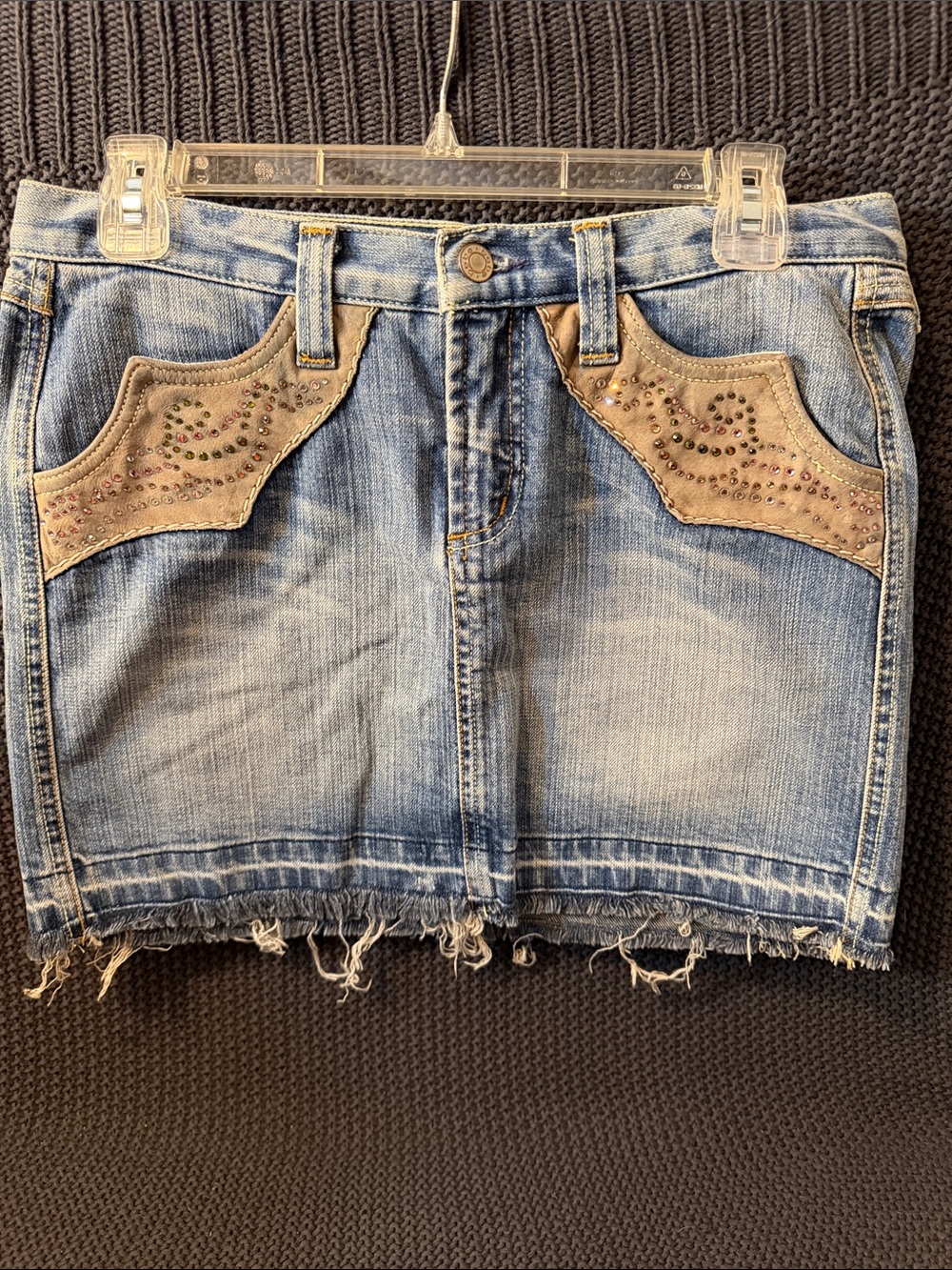 bebe Light Blue Denim Mini Skirt with Tan Studded Pocket Accents